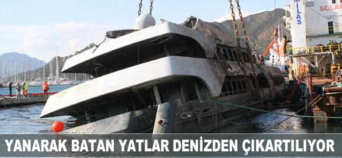 Yanarak batan yatlar denizden çıkartılıyor