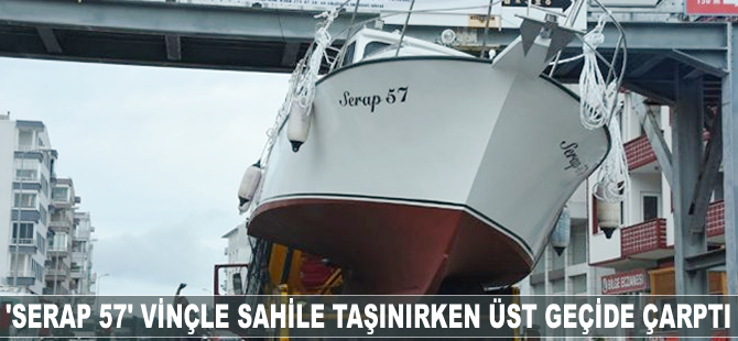 Vinçle sahile taşınan 'Serap 57' teknesi üst geçide çarptı