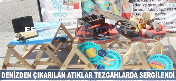Denizden çıkarılan atıklar balıkçı tezgahlarında sergilendi