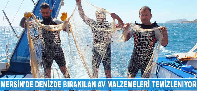 Mersin'de denizde bırakılan av malzemeleri temizleniyor