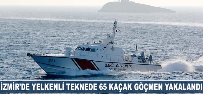 İzmir'de yelkenli teknede 65 kaçak göçmen yakalandı