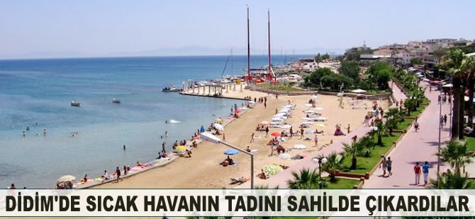 Didim'de sıcak havanın tadını sahilde çıkardılar