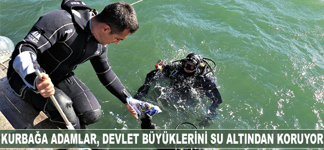 Kurbağa adamlar, devlet büyüklerini su altından koruyor