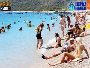 Kemer'de turizm sezonu erken açıldı, plajlar turistle doldu