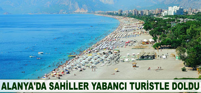 Alanya’da sahiller yabancı turistle doldu