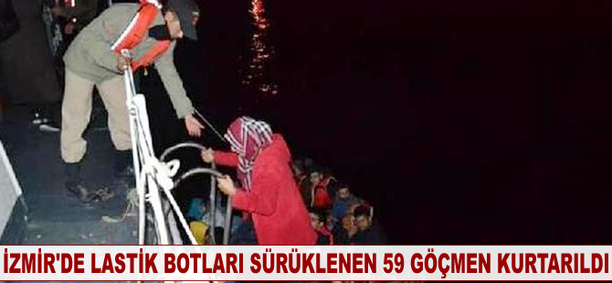 İzmir'de lastik botları sürüklenen 59 kaçak göçmen kurtarıldı