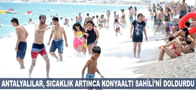 Antalyalılar, sıcaklık artınca Konyaaltı Sahili'ni doldurdu