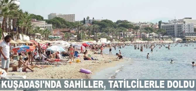 Kuşadası'nda sahiller tatilcilerle doldu