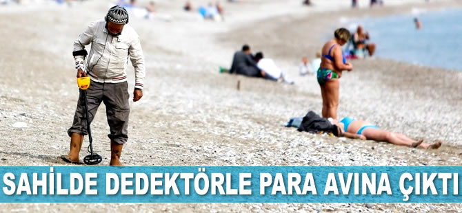 Define avcıları, Antalya sahilinde dedektörle para avına çıktı