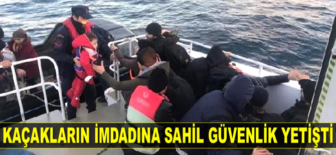 Ayvalık’ta tekneleri sürüklenen kaçakların imdadına Sahil Güvenlik yetişti