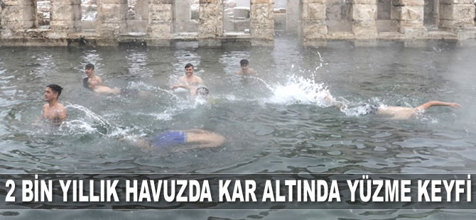 Yozgat’ta iki bin yıllık havuzda kar altında yüzme keyfi yaşanıyor