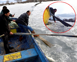 Çıldır'daki balıkçılar av için buzların erimesini bekliyor