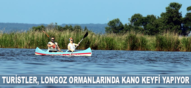 Yerli ve yabancı turistler, longoz ormanlarında kano keyfi yapıyor