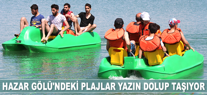 Hazar Gölü'ndeki plajlar tatilcilerin akınına uğruyor