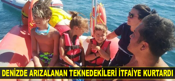 Burhaniye’de denizde arızalanan teknedekileri itfaiye kurtardı