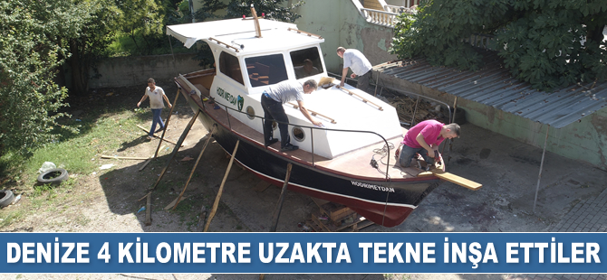 Denize 4 kilometre uzakta mahalle arasında tekne inşa ettiler