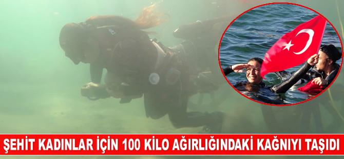 Derya Can, şehit kadınlar için deniz altında 100 kiloluk kağnıyı taşıdı
