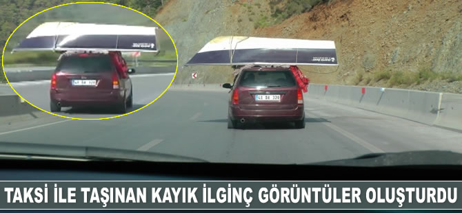 Otomobil üzerinde taşınan kayık ilginç görüntüler oluşturdu