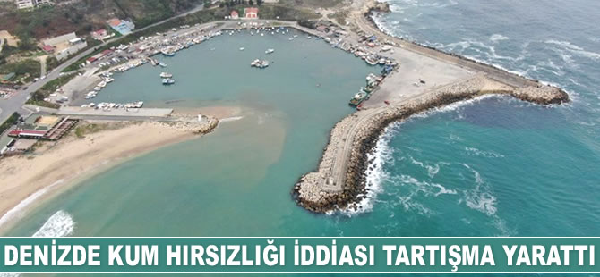 Karaburun'da denizde kum hırsızlığı iddiası tartışma yarattı