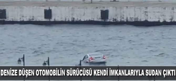 Denize düşen otomobilin sürücüsü kendi imkanlarıyla sudan çıktı