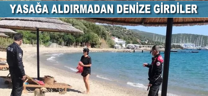 Sokağa çıkma yasağına aldırmadan denize girdiler