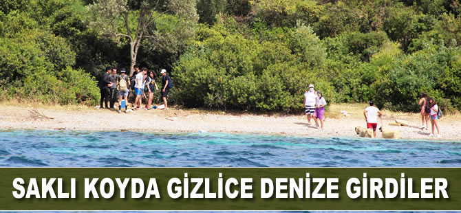 Saklı koyda gizi saklı denize girdiler