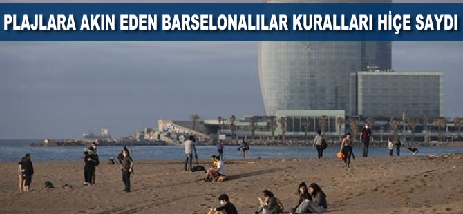 Plajlara akın eden Barselonalılar, kuralları hiçe saydı