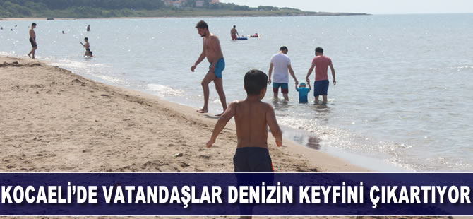 Kocaeli’de vatandaşlar denizin keyfini çıkarmaya başladı