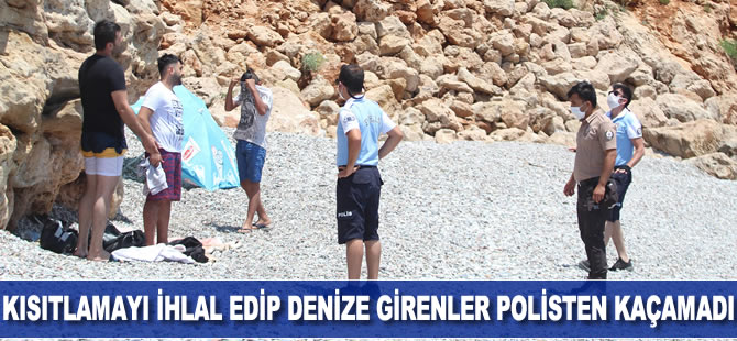 Kısıtlamayı ihlal edip denize girenler polisten kaçamadı