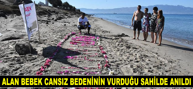 Alan bebek cansız bedeninin vurduğu sahilde çiçeklerle anıldı