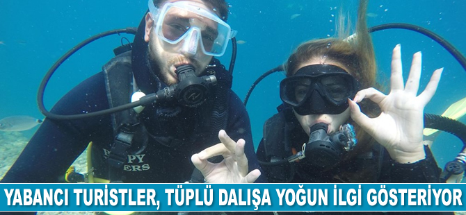 Yabancı turistler, Marmaris'te tüplü dalışa yoğun ilgi gösteriyor