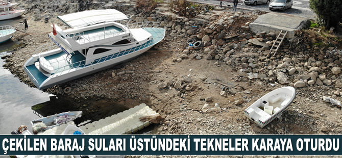 Çekilen baraj suları üstünde bulunan tekneler karaya oturdu