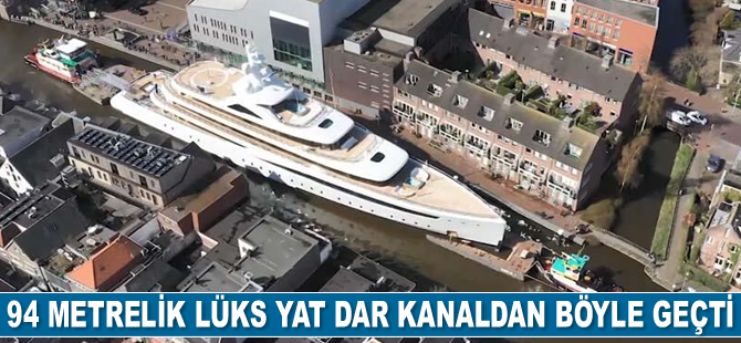 Hollanda’da 94 metrelik lüks yat dar kanaldan geçti