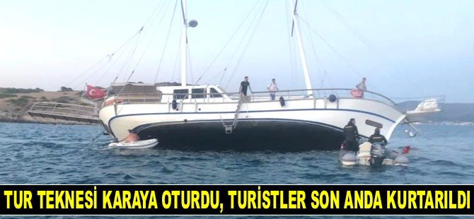 Tur teknesi karaya oturdu, turistler son anda kurtarıldı