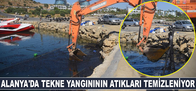 Alanya'da tekne yangınının atıkları temizleniyor