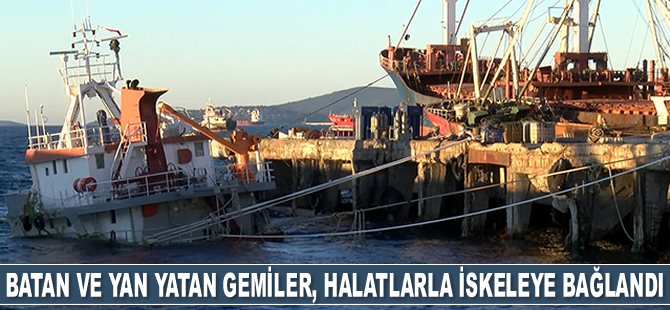 Kartal'da batan ve yan yatan gemiler, halatlarla iskeleye bağlandı