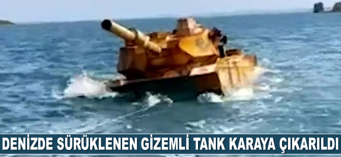 Endonezya’da denizde sürüklenen gizemli tank karaya çıkarıldı