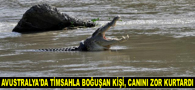 Timsahla boğuşan kişi, canını zor kurtardı