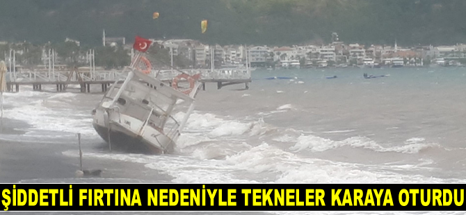 Marmaris'te şiddetli fırtına nedeniyle tekneler karaya oturdu