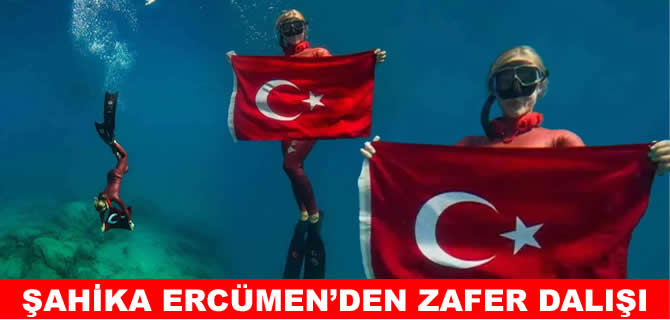 Şahika Ercümen'den batık tanka Türk bayrağıyla dalış