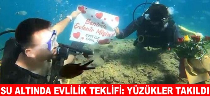 Su altında evlilik teklifi: Yüzükler takıldı