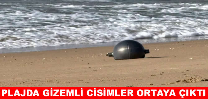 Avustralya'da plajda gizemli metal küreler ortaya çıktı