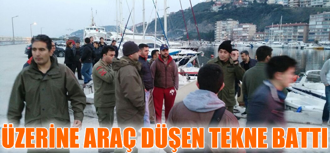 Teknenin üzerine düşen otomobil, tekneyle birlikte battı