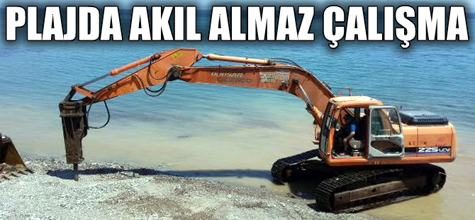 Mavi Bayraklı plajda iş makineli çalışmaya vatandaş engeli