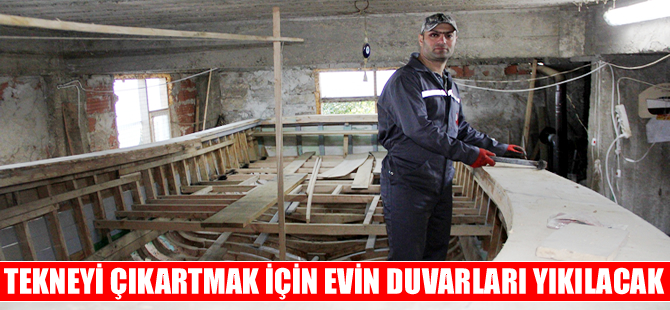 Evin bodrumunda yaptığı tekneyi çıkarmak için duvarları yıkacak