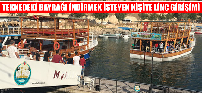 Teknedeki Türk Bayrağı'nı indirmek isteyen kişiye linç girişimi