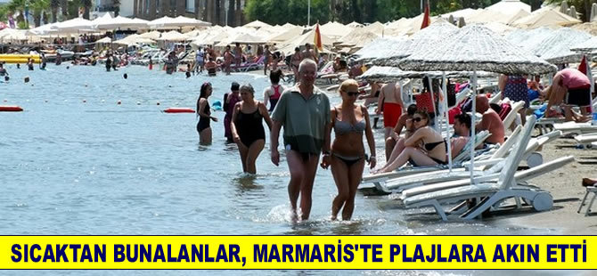 Sıcaktan bunalanlar Marmaris plajlarına akın etti