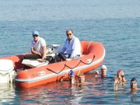 Milli yüzücüler İzmir'de deniz dibi temizliği yaptı