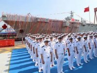 Çin'in ilk helikopter platformlu çıkarma gemisi suya indirildi