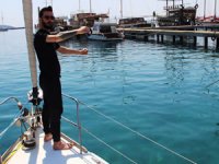 Sokağa çıkma yasağına denizde yakalandılar